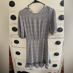 Speckled, short dress. Black and cream color. Size small.